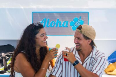Board from Waikiki Beach for our Aloha Hour Sail - Where you meet: Duke Kahanamoku Statue and the shoreline check-in