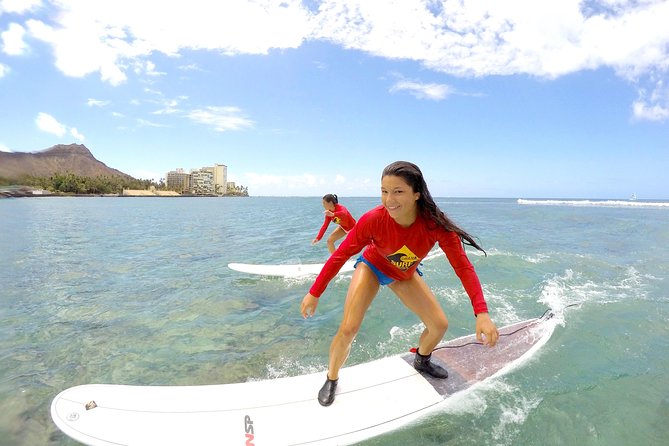 Exclusive Group Surfing Lesson with Waikiki Courtesy Shuttle - Check-in, gear, and the safety briefing that sets you up