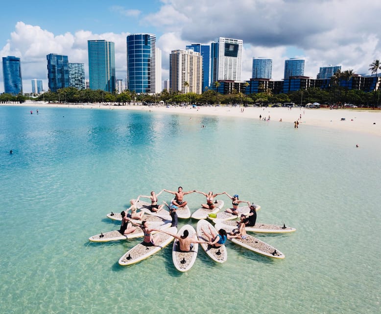 Honolulu: SUP (Standup Paddleboard) Yoga Class - From shore to waist-deep water: the anchor that changes everything