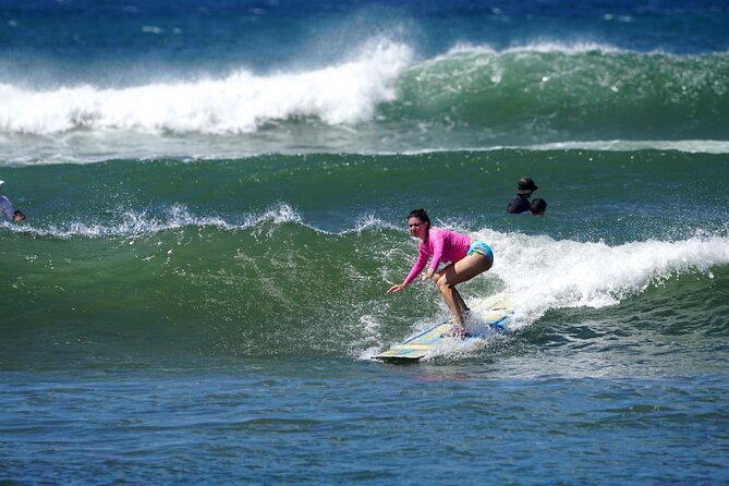 Learn to surf with a local big wave rider on the North Shore of Oahu - Board Burn, Sea Sickness, and Other First-Timer Reality Checks
