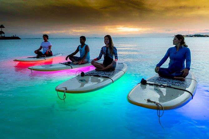 Night SUP Yoga in Honolulu, Hawaii - The 1 hour 15 minutes flow: from check-in to floating savasana