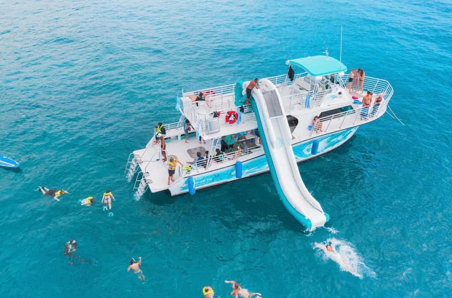 Oahu: Dolphin Watching & Turtle Snorkeling with Waterslide - Why Oahu’s west coast boat tour feels more real than a quick stop