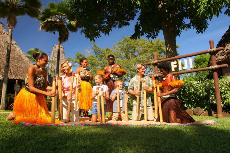 Oahu: Islands of Polynesia and "HA: Breath of Life Show" - Tahiti village: the ceremonial moment, pole fishing, and hip-shaking dance