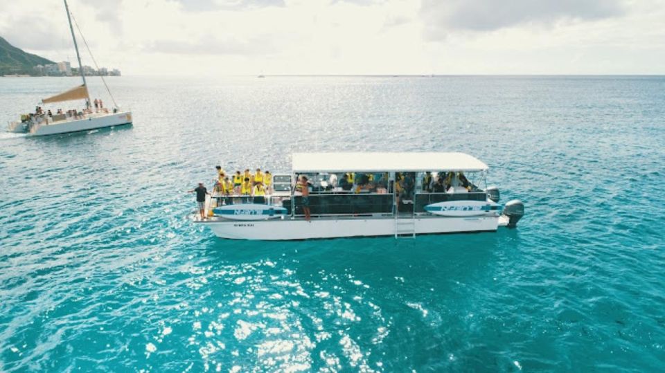 Oahu Snorkeling with Turtles, Water Scooter, Paddleboard - Turtle Canyon on a catamaran: the setting that makes this tour work