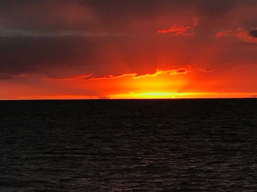 Oahu: Sunset sailing in small intimate groups - Golden Hour Magic: Waikiki Lights, Moonrise, and the Sun’s Drop