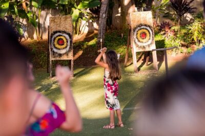 Paradise Cove Luau - Pre-show flow: Hawaiian games, arts and crafts, and the pageantry buildup