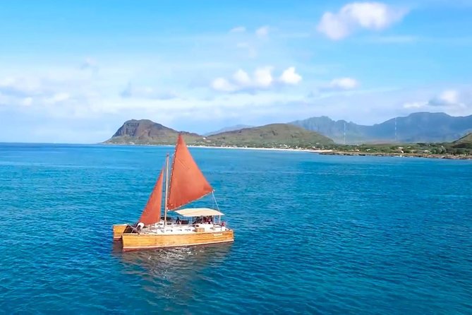 Polynesian Canoe Day Sail - Onboard mood: live ukulele music and chants while Waikiki slides past