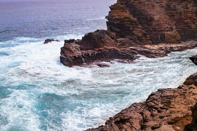 Private Half-Day Circle Island Highlights Tour in Oahu - Kualoa Regional Park: coastal framing with Chinamans Hat