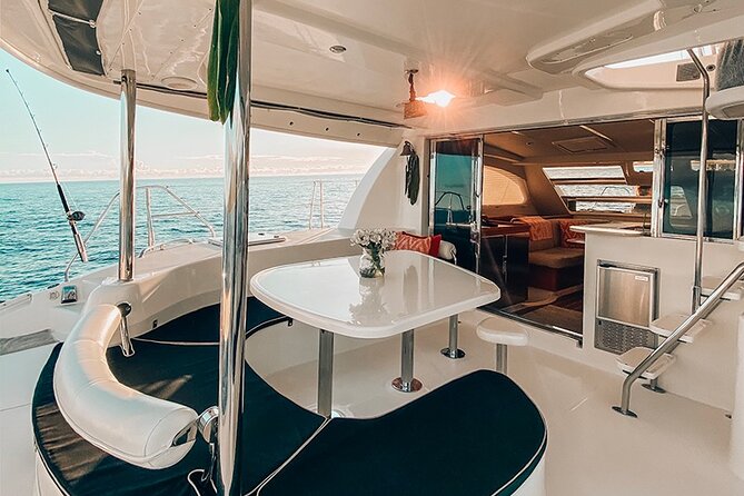 Private Oahu Sunset Charter with Tasting and Drinks - The anchor in Sunset Channel: the best part of the sky show