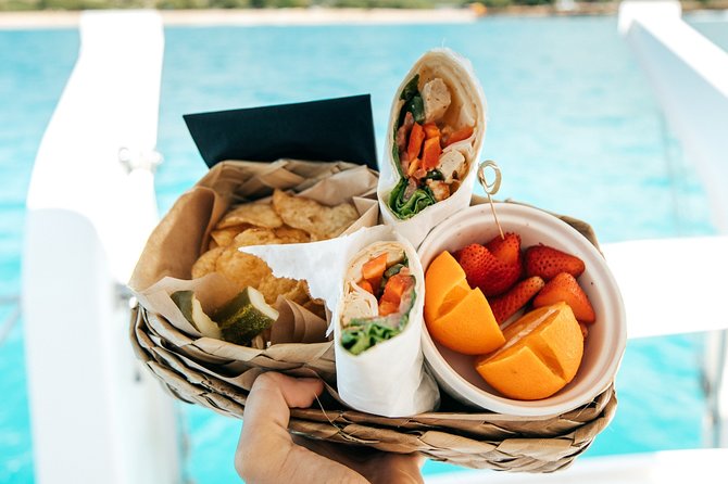 Private Snorkel Trip from Oahu on a Yacht - On-deck comfort: hosted drinks and an included lunch