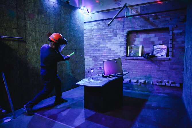 Rage Room Experience in Hawaii - Inside the smashing room: gloves, iPod music, and synced lights
