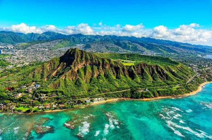 Scenic half day Circle Island tour - Nuuanu Pali Lookout: wind, views, and the Kamehameha I turning point