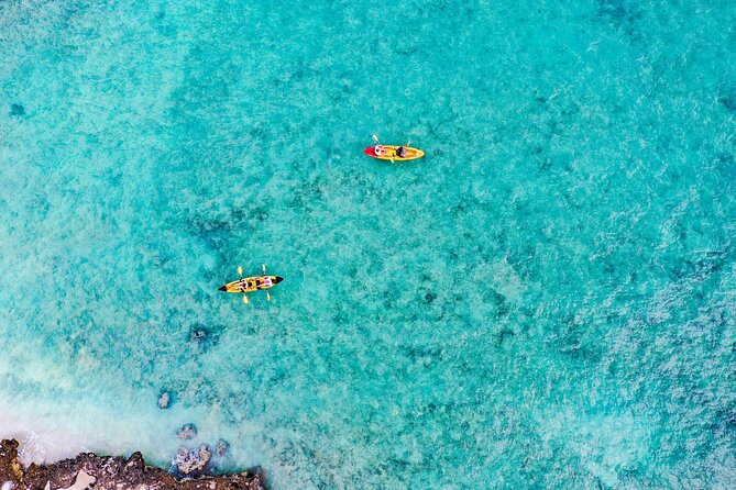 Self-Guided Kayaking Tour in Kailua Bay and Popoia Island - Coming back to Kailua Beach Park: chairs, umbrella, and the best kind of waiting