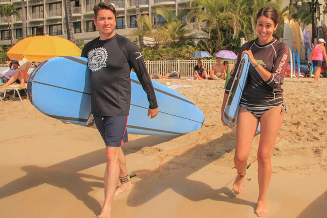 Semi-Private Surf Lesson for 2 or 3 people on Waikiki Beach - In the water at Waikiki: paddling, catching waves, and getting your first real try