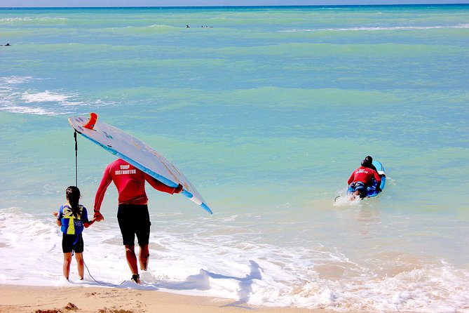 Surf HNL: Surf Lessons near Ko'olina!!!!! - The 1-hour surf plan: sand practice, paddling out, then waves