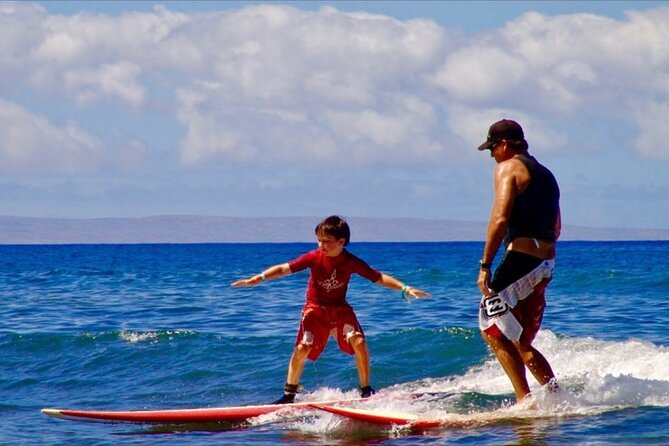 Surfing Waikiki with local Firefighters - Getting there: Duke Paoa Kahanamoku Statue and the grey Tacoma pickup
